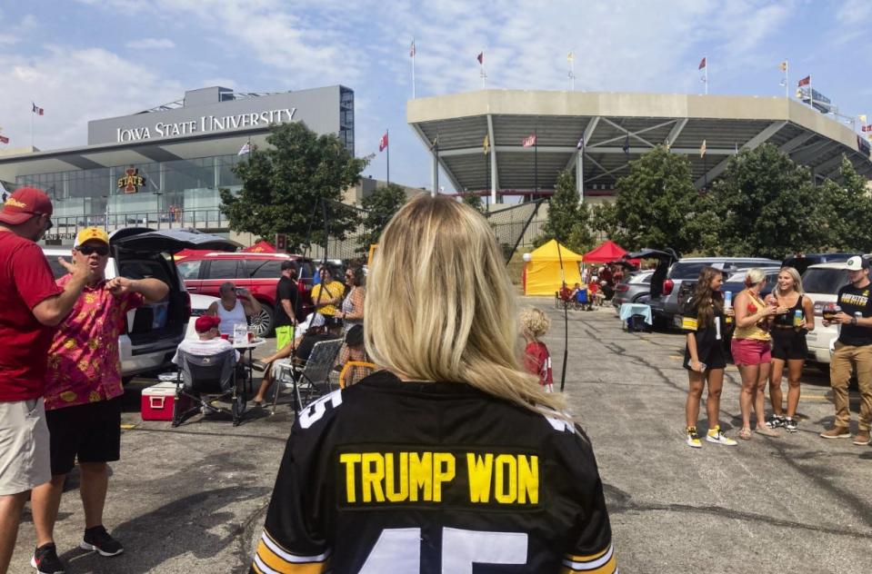 People attend a tailgating event ahead of the Cy-Hawk game in Ames on Sept. 9, 2023.