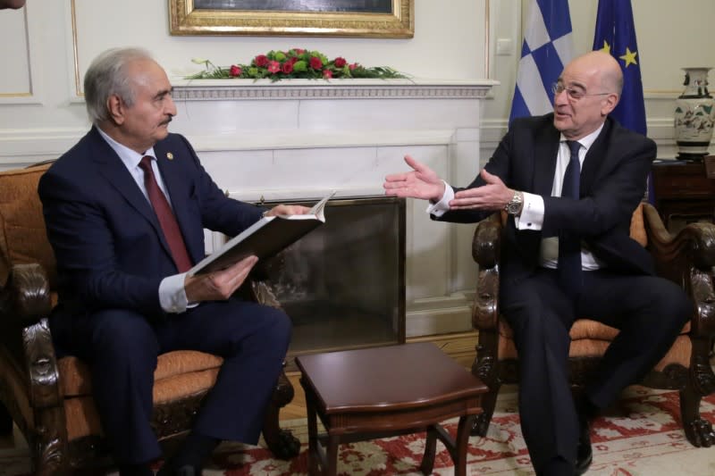 Greek Foreign Minister Nikos Dendias meets Libya's commander Khalifa Haftar at the Foreign Ministry in Athens