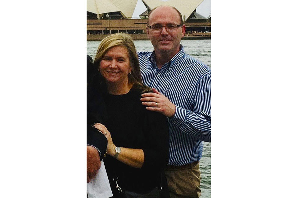 In this undated photo provided by the family/Knox Grammar School, Martin, right, and Barbara Hollander pose for a photo in Sydney, Australia. The Hollanders are missing and believed to be dead after a volcano erupted near Whakatane, New Zealand, Monday, Dec. 9, 2019. (Family/Knox Grammar School via AP)