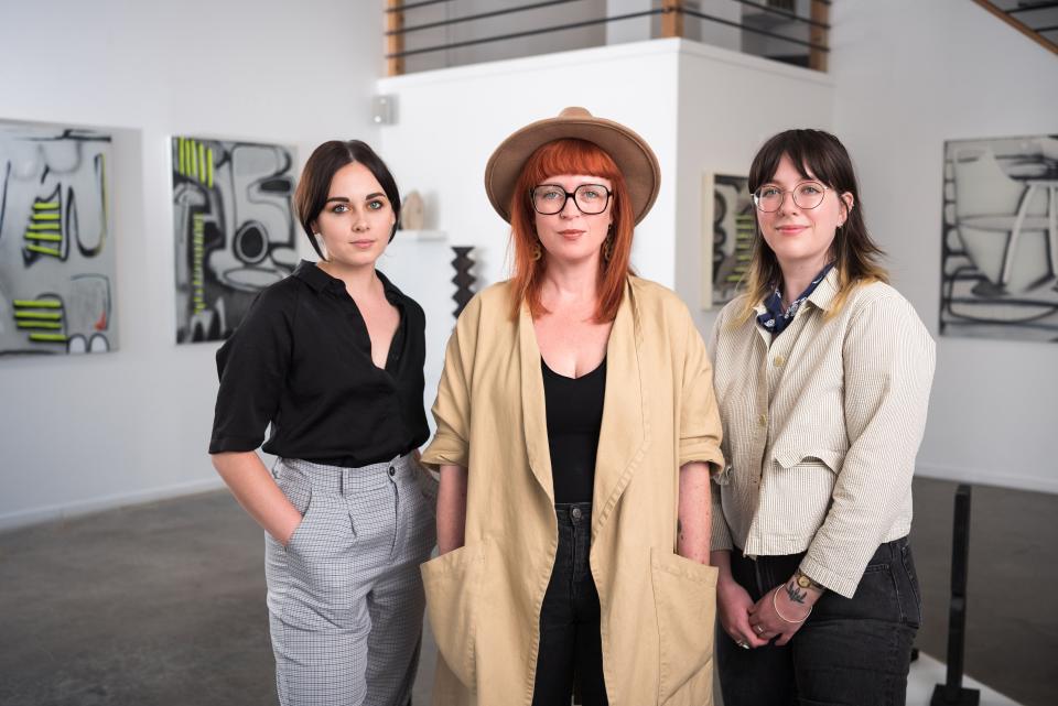 Red Arrow Gallery staff members Ashley Layendecker, Katie Shaw and Lexie Roland