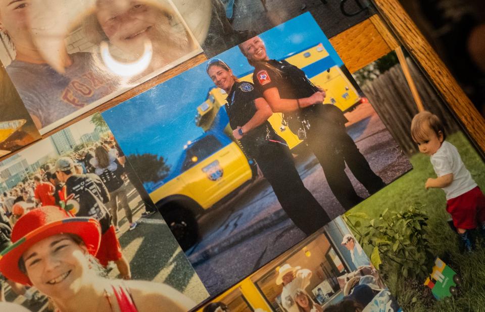 Erin Ruiz, right, and her partner, Krislyn McSherry, are in a photo displayed in Ruiz's home. Ruiz said she misses the community and friendships from working in EMS, but the low pay and high demands of the job pushed her out. Austin-Travis County EMS currently has a 17% vacancy rate.