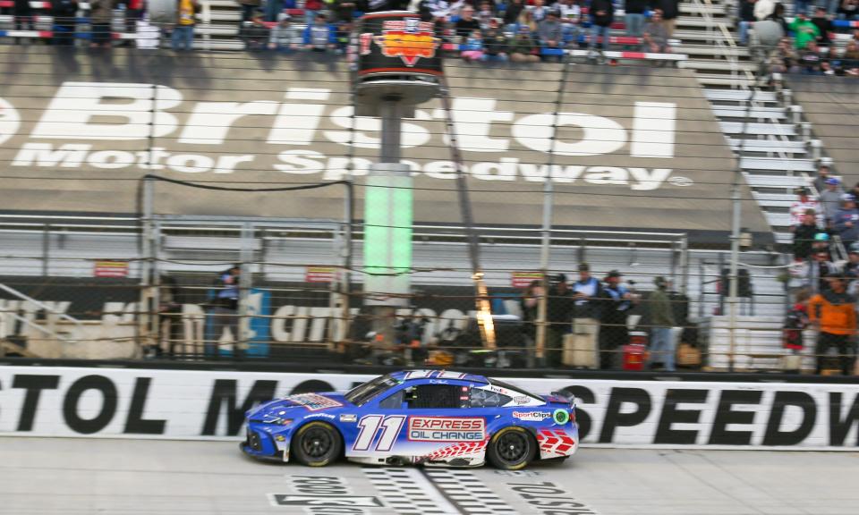Mar 17, 2024; Bristol, Tennessee, USA; NASCAR Cup Series driver Denny Hamlin (11) wins the Food City 500 at Bristol Motor Speedway. Mandatory Credit: Randy Sartin-USA TODAY Sports