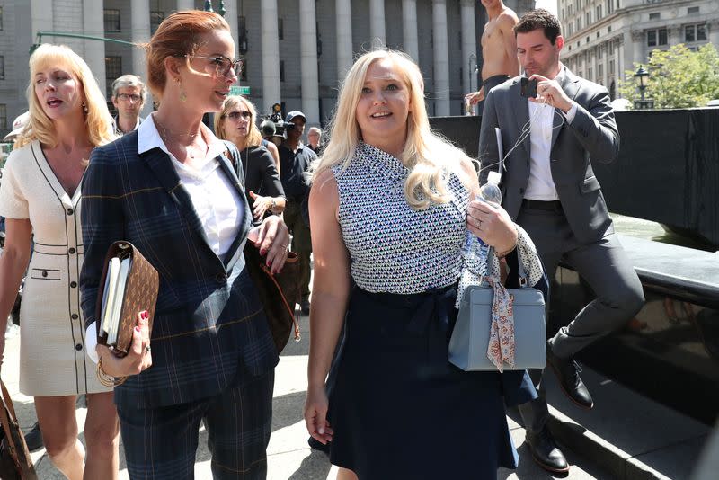 Giuffre, an alleged victim of Epstein, walks after the hearing in the criminal case against him at Federal Court in New York