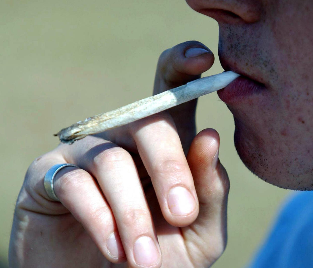 EMBARGOED TO 2330 TUESDAY MARCH 19 File photo of a cannabis joint. Smoking potent forms of cannabis greatly increases the risk of serious mental illness, a major study has found.