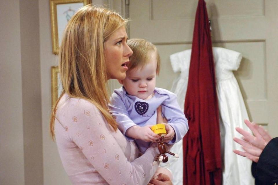 Jennifer Aniston in Friends as Rachel Green with Cali Sheldon/Noelle Sheldon as Emma Geller-Green | NBC/NBCU Photo Bank via Getty