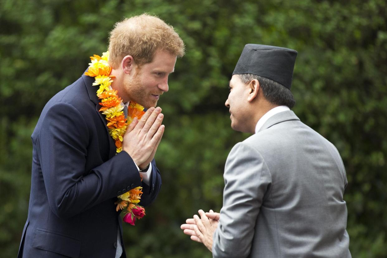 Visit: Prince Harry receives a traditional welcome: Getty Images