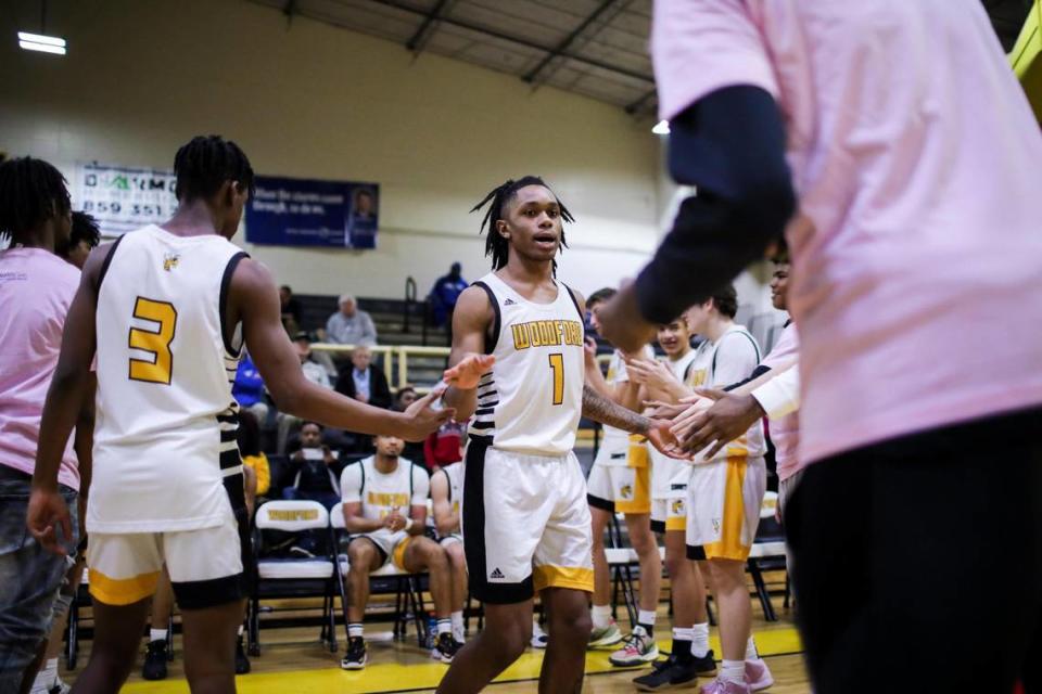 Makhi Smith (1) and Woodford County, representing the 8th Region, were to face Jeffersontown, representing the 6th, in the opening game of the 2023 boys’ high school basketball state tournament in Rupp Arena on Wednesday morning.