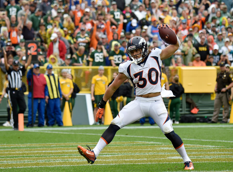 GREEN BAY, WISCONSIN - SEPTEMBER 22: Phillip Lindsay #30 of the Denver Broncos reacts after scoring a touchdown in the first quarter against the Green Bay Packers at Lambeau Field on September 22, 2019 in Green Bay, Wisconsin. (Photo by Quinn Harris/Getty Images)