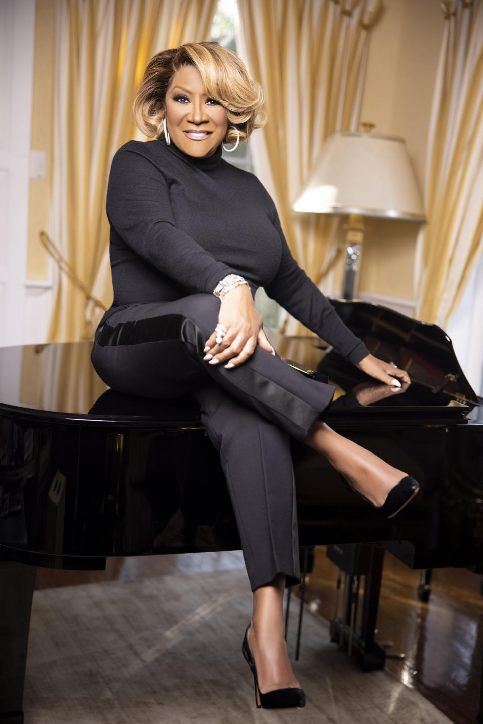 This December 2020 photo released by Hearst shows a portrait of singer Patti Labelle, taken by Whitney Thomas for "Lift Every Voice" project. Oprah Winfrey and Hearst Magazines teamed up for interviews that pair young Black journalists with elders that include civil rights activists, celebrities and others who share some lessons learned in life. (Whitney Thomas/Hearst via AP)