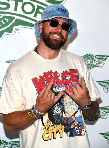 <p>Fernando Leon/Getty</p> Travis Kelce poses for a photo at Kelce Jam