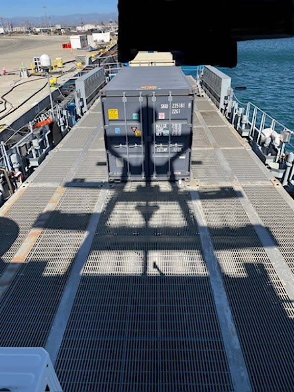 A view of Nomad's large open rear deck from the auction listing. Note also that whatever is moored behind the ship has been blacked out. <em>GSA</em>