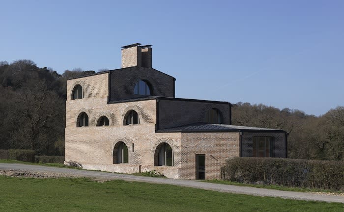 Nithurst Farm in Sussex occupies the site of a former farm house in a secluded valley and conjures up memories of farm buildings in Italy (Picture: Brotherton Lock)