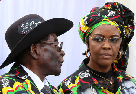 FILE PHOTO: President Robert Mugabe and his wife Grace attend a rally of his ruling ZANU (PF) in Chinhoyi, Zimbabwe, July 29, 2017. REUTERS/Philimon Bulawayo