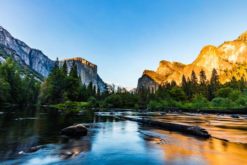 <p>One of the most well-known national parks and a UNESCO World Heritage site to boot, <a href="https://www.nps.gov/yose/index.htm" rel="nofollow noopener" target="_blank" data-ylk="slk:Yosemite;elm:context_link;itc:0;sec:content-canvas" class="link ">Yosemite</a> features scenic valleys you can hike through and breathtaking waterfalls to discover while rafting. Some must-see attractions are the granite monolith at Half Dome and Yosemite Falls, one of the tallest waterfalls in North America.</p>