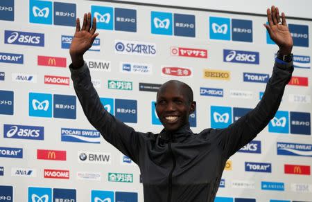 Athletics - Tokyo Marathon 2017 - Tokyo, Japan - 26/02/17 - Gold medalist Wilson Kipsang of Kenya waves on podium. REUTERS/Toru Hanai