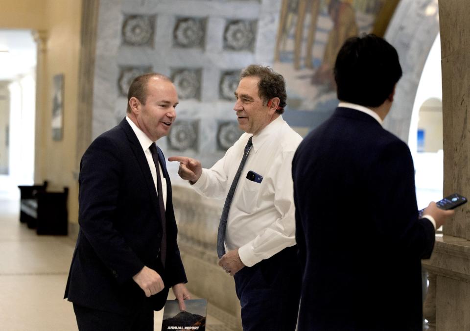 U.S. Sen. Mike Lee, R-Utah, speaks to Rep. Brian King, D-Salt Lake City, at the Capitol in Salt Lake City on Wednesday, Feb. 21, 2024. | Laura Seitz, Deseret News