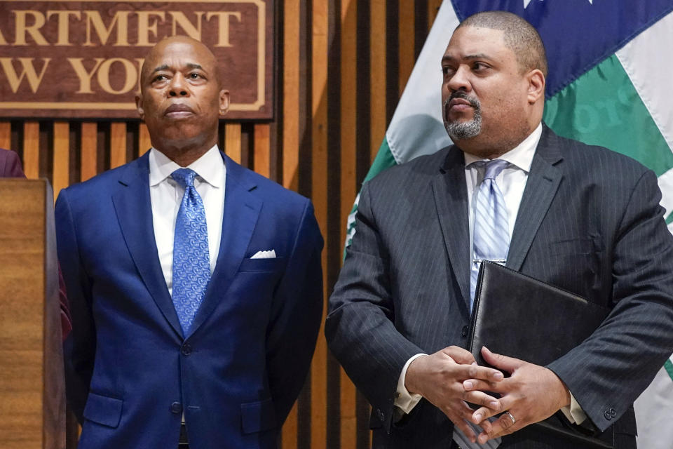 FILE — New York Mayor Eric Adams, left, and Manhattan District Attorney Alvin Bragg, participate in a news conference at police headquarters, April 18, 2023, in New York. Bragg has announced an indictment of several people who allegedly participated in a straw donor scheme to raise money for Adams, Friday, July 7, 2023. (AP Photo/Mary Altaffer, File)