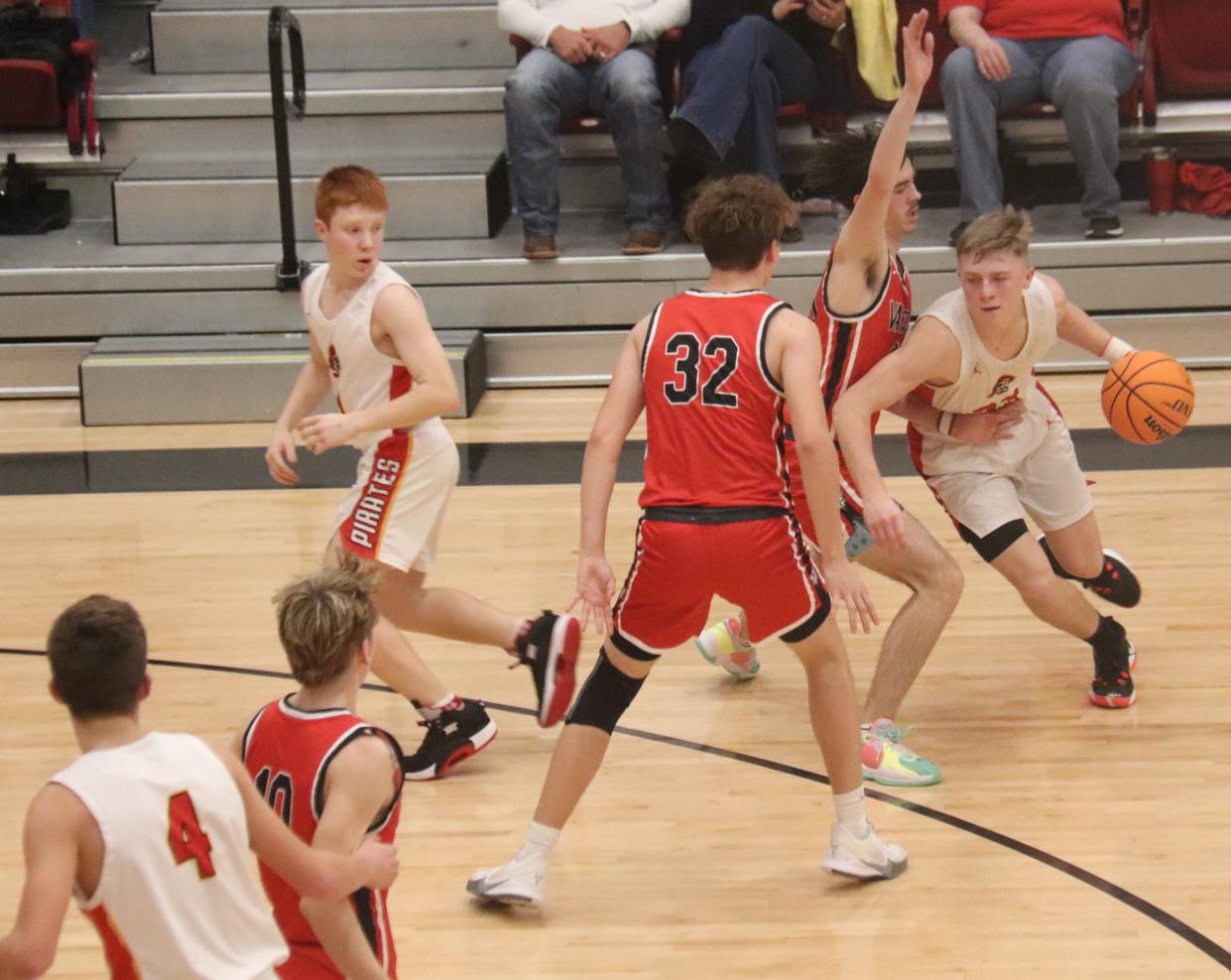 Dale's Dayton Forsythe tries to dribble through the Vanoss defense while teammate Easton Edmonson rolls toward the basket. Also pictured for Dale is Jett Higdon.