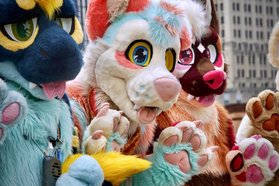 Furries pose for photos at Anthrocon 2023, one of the world's largest anthropomorphic conventions celebrating the furry subculture, in which people dress up or roleplay as animal characters, at the David L. Lawrence Convention Center in Pittsburgh, Pennsylvania, on July 1, 2023. (