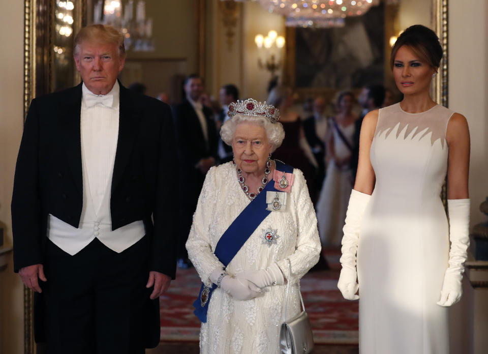 Melania Trump wore a Dior gown with elegant elbow-high gloves. [Photo: Getty]  