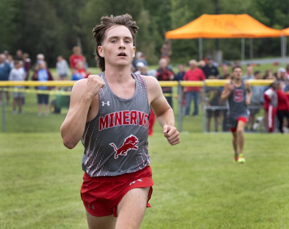 Minerva’s Graysyn Rettig wins the boys big school division of the East Canton Cross Country Invitational, Wednesday, Aug. 30, 2023.