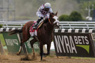 Tiz the Law (8), with jockey Manny Franco up, crosses the finish line to win the152nd running of the Belmont Stakes horse race, Saturday, June 20, 2020, in Elmont, N.Y. (AP Photo/Seth Wenig)