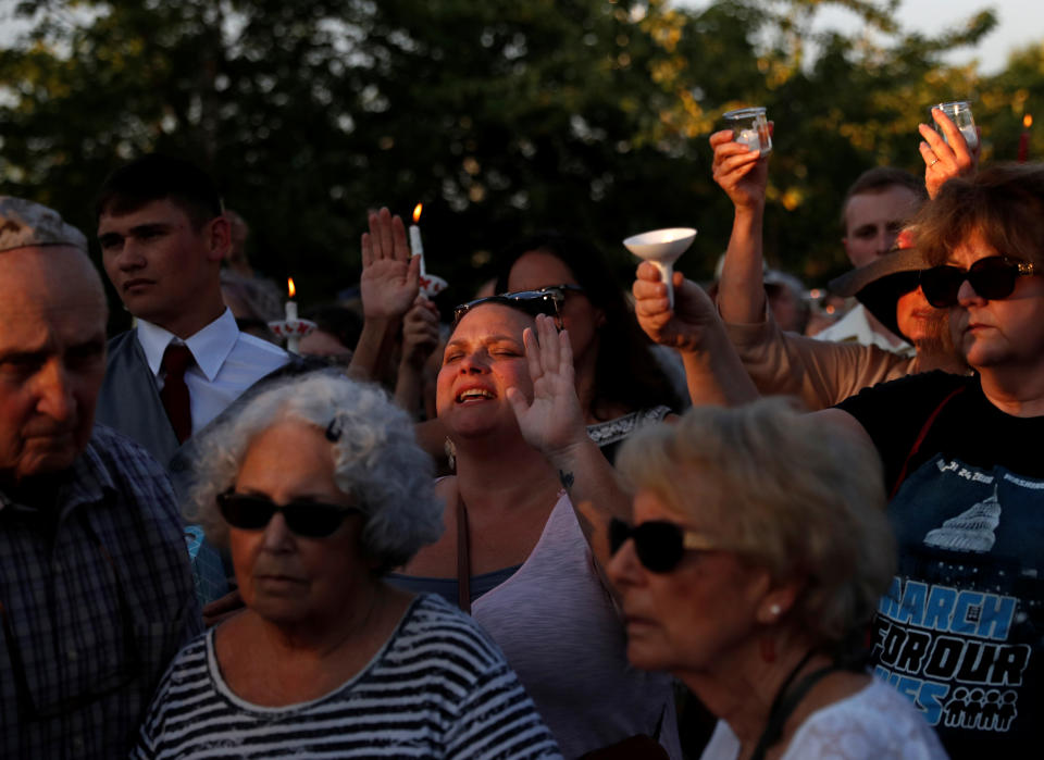 Mourners remember 5 people slain at the Capital Gazette in Annapolis, Md.