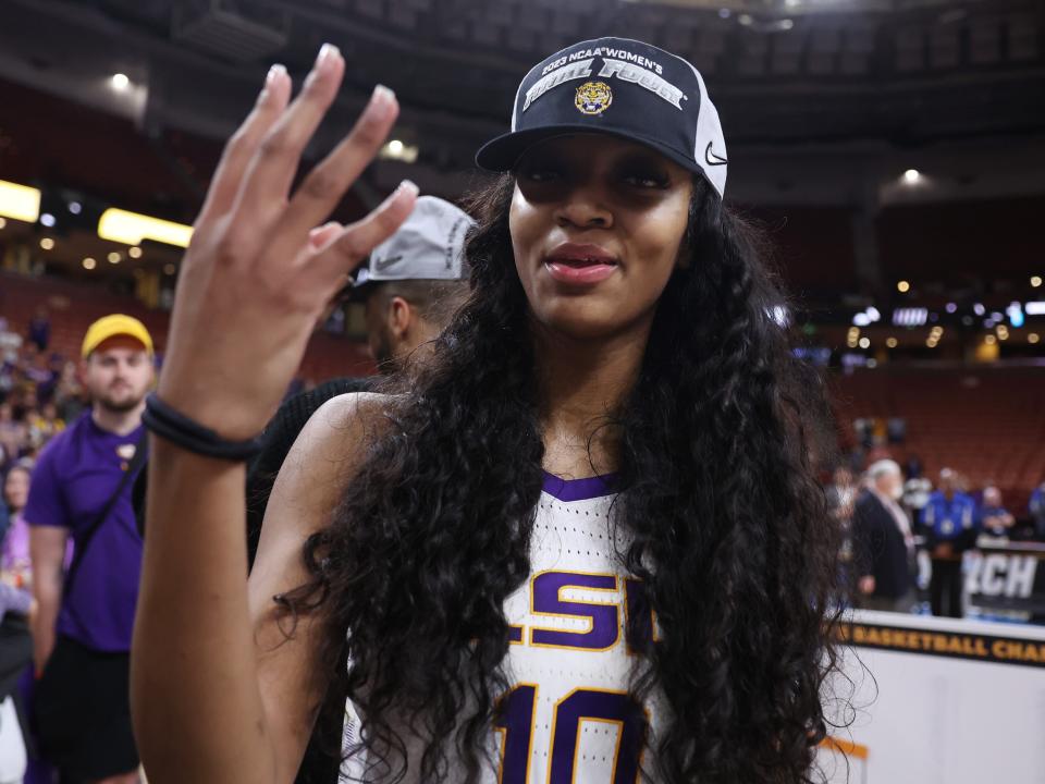 Angel Reese #10 of the LSU Lady Tigers celebrates after defeating the Miami Hurricanes 54-42 in the Elite Eight round of the NCAA Women's Basketball Tournament at Bon Secours Wellness Arena on March 26, 2023