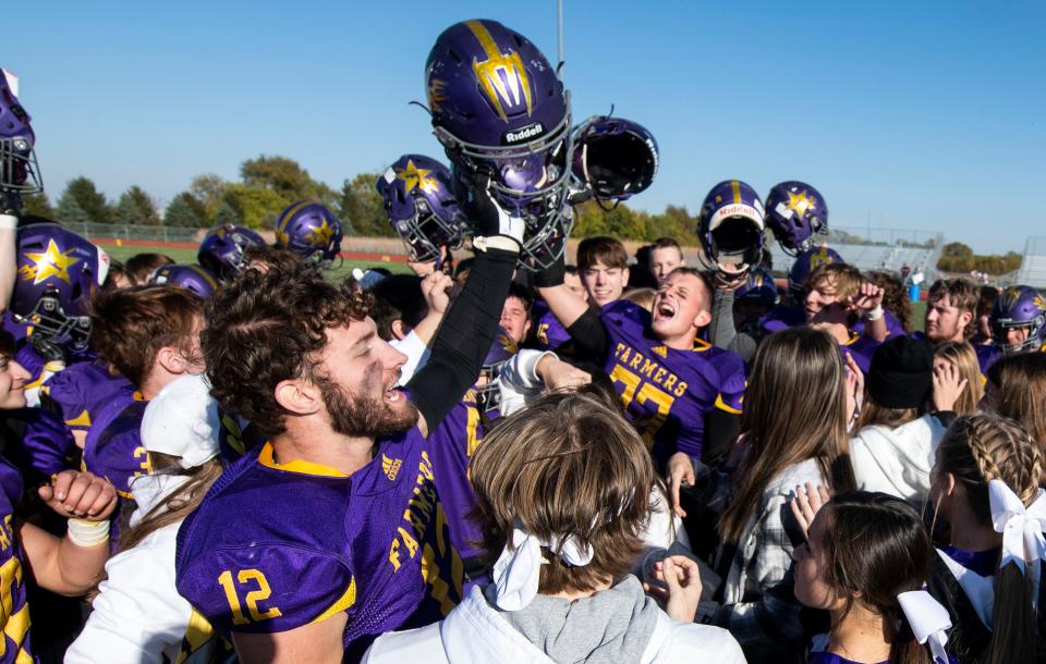 The Farmington Farmers cheer after their win against Tremont High School in the class 2A second round playoff game at Farmington High on Saturday, Nov. 6, 2021. The Farmers beat the Turks 35-12.