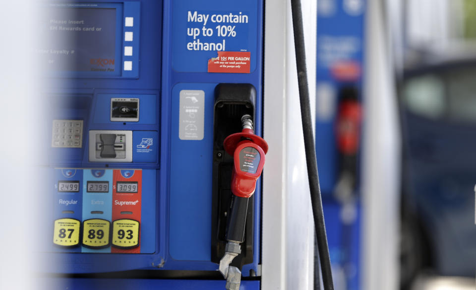 FILE - This June 26, 2019, file photo shows a gasoline pump at a refueling station in Pittsboro, N.C. On Tuesday, Aug. 13, the Labor Department reports on U.S. consumer prices for July. (AP Photo/Gerry Broome, File)