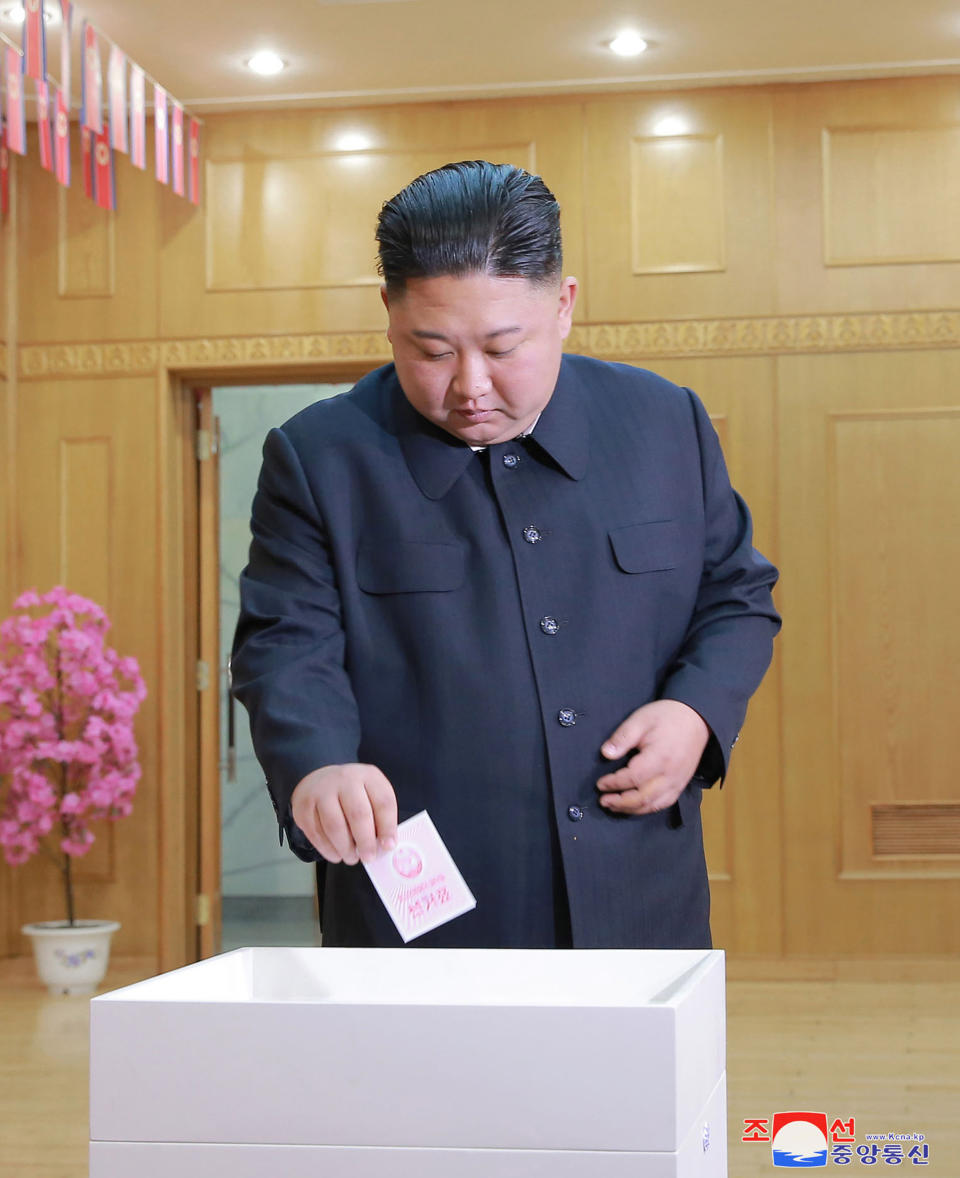 In this photo provided by the North Korean government, North Korean leader Kim Jong Un casts his vote at a polling center at Pyongyang's Kim Chaek University of Technology in Pyongyang, North Korea, Sunday, March 10, 2019. Millions of North Korean voters, including Kim, went to the polls on Sunday to elect a new lineup of roughly 700 members for the next session of the national legislature, though the vote was more of an endorsement than a competitive contest.Independent journalists were not given access to cover the event depicted in this image distributed by the North Korean government. The content of this image is as provided and cannot be independently verified. Korean language watermark on image as provided by source reads: "KCNA" which is the abbreviation for Korean Central News Agency. (Korean Central News Agency/Korea News Service via AP)