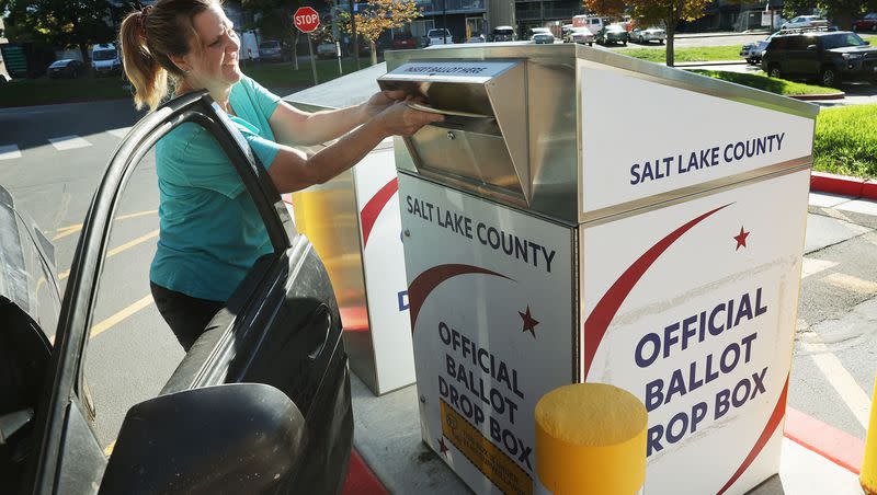 Tracy Ashcraft drops off her ballot during Utah’s municipal and primary elections, which includes the 2nd Congressional District special primary, at the Salt Lake County Government Center in Salt Lake City on Tuesday, Sept. 5, 2023.