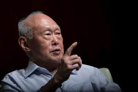 Former Singapore Prime Minister Lee Kuan Yew (LKY) makes a point as he speaks during the LKY School of Public Policy 7th anniversary dialogue session in Singapore in this September 14, 2011 file photo. REUTERS/Tim Chong/Files