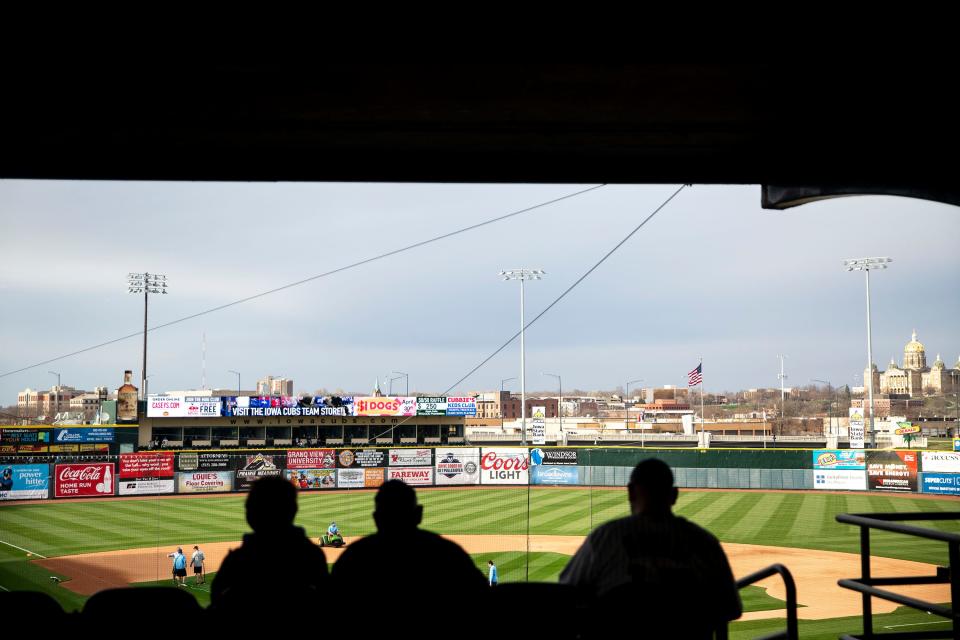 Baseball fans wait in the stands for the start of the Iowa Cubs' home opener against the New Orleans Baby Cakes on Tuesday, April 9, 2019, at Principal Park in Des Moines. 