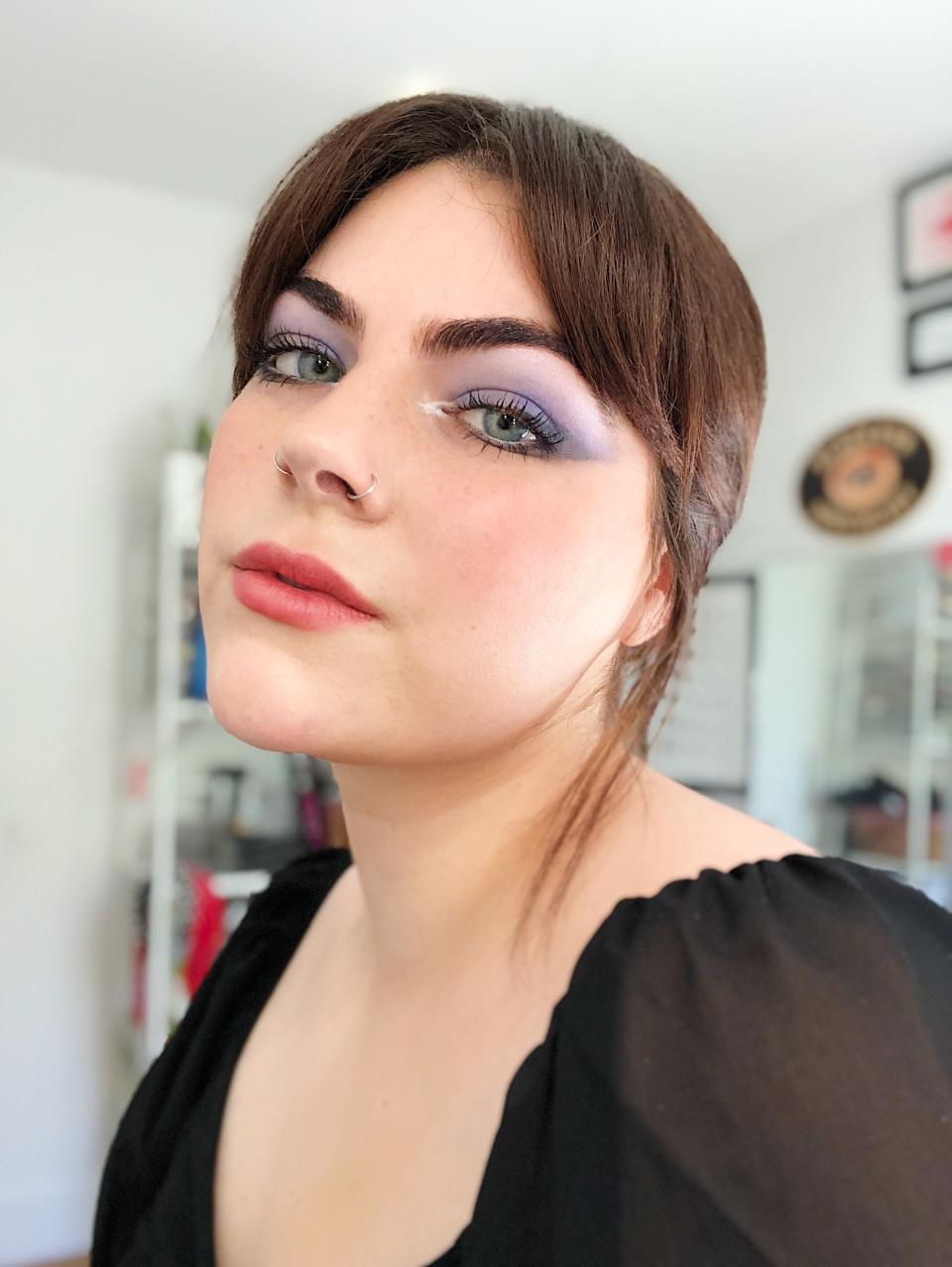 Staff writer Nicola Dall'Asen Wears Urban Decay x Prince Let's Go Crazy Eye Shadow Palette, Kajal Eyeliners, and Liquid Highlighter.