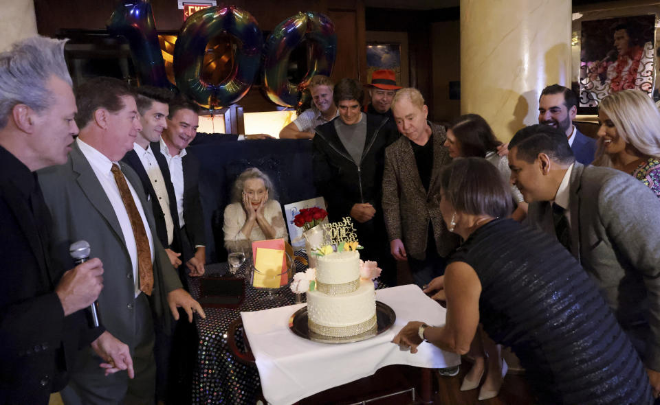 Magician Gloria Dea is honored fellow magicians, including David Copperfield and Teller, during her 100th birthday celebration at the Westgate in Las Vegas on Thursday, Aug. 25, 2022. Dea, touted as the first magician to perform on what would become the Las Vegas Strip in the early 1940s, has died. One of Dea's caretakers said she died Saturday, March 18, 2023, at her Las Vegas residence. She was 100. (K.M. Cannon/Las Vegas Review-Journal via AP)