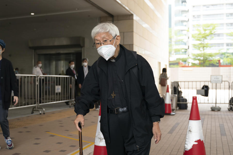 Cardinal Joseph Zen leaves the West Kowloon Magistrates's Courts after the verdict session in Hong Kong, Friday Nov. 25, 2022. The 90-year-old Catholic cardinal and five others in Hong Kong were fined after being found guilty Friday of failing to register a now-defunct fund that aimed to help people arrested in the widespread protests three years ago. (AP Photo/Anthony Kwan)