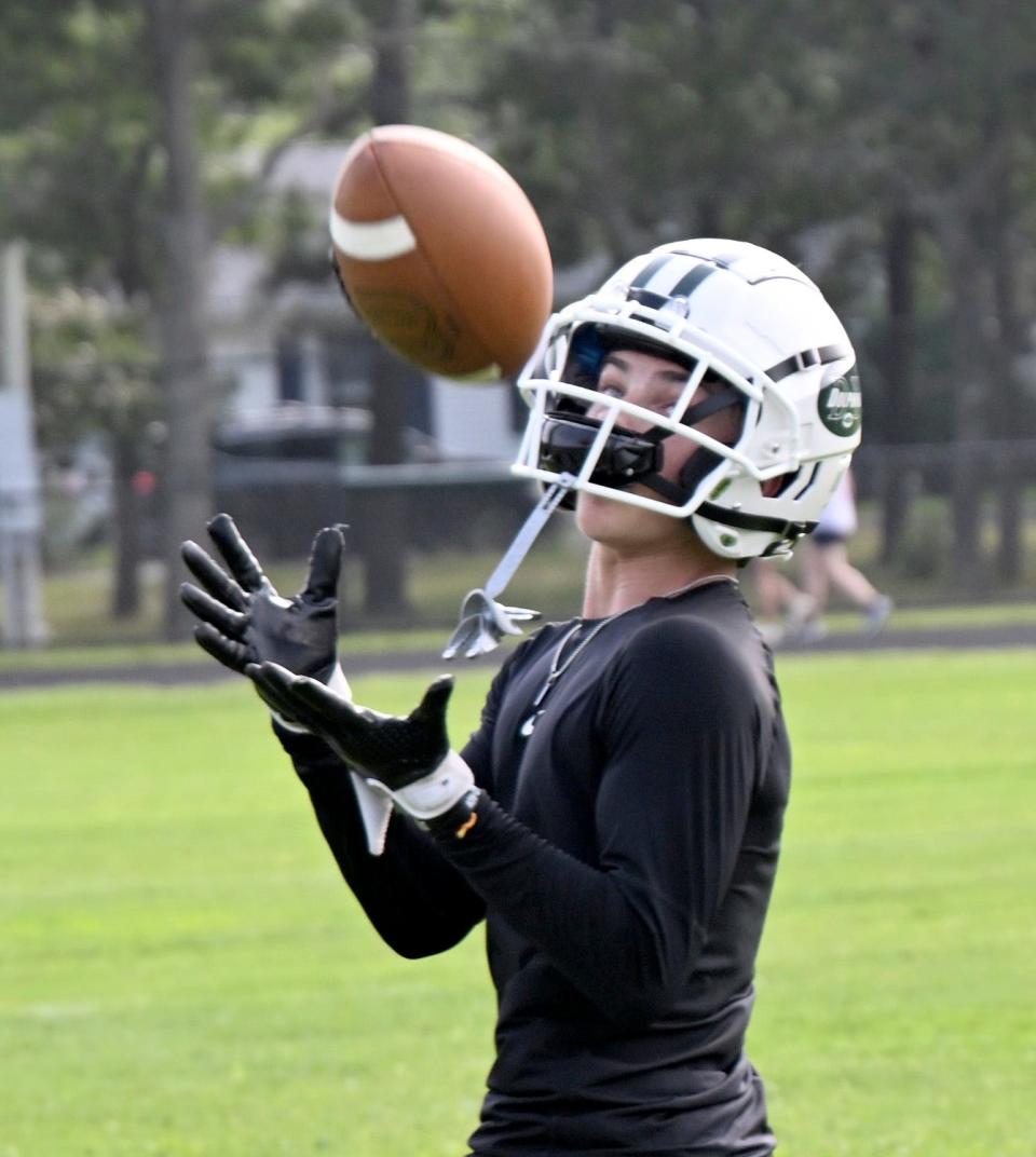 D-Y receiver Peyton Kellett takes in a pass during an Aug. 21, 2023, practice session.