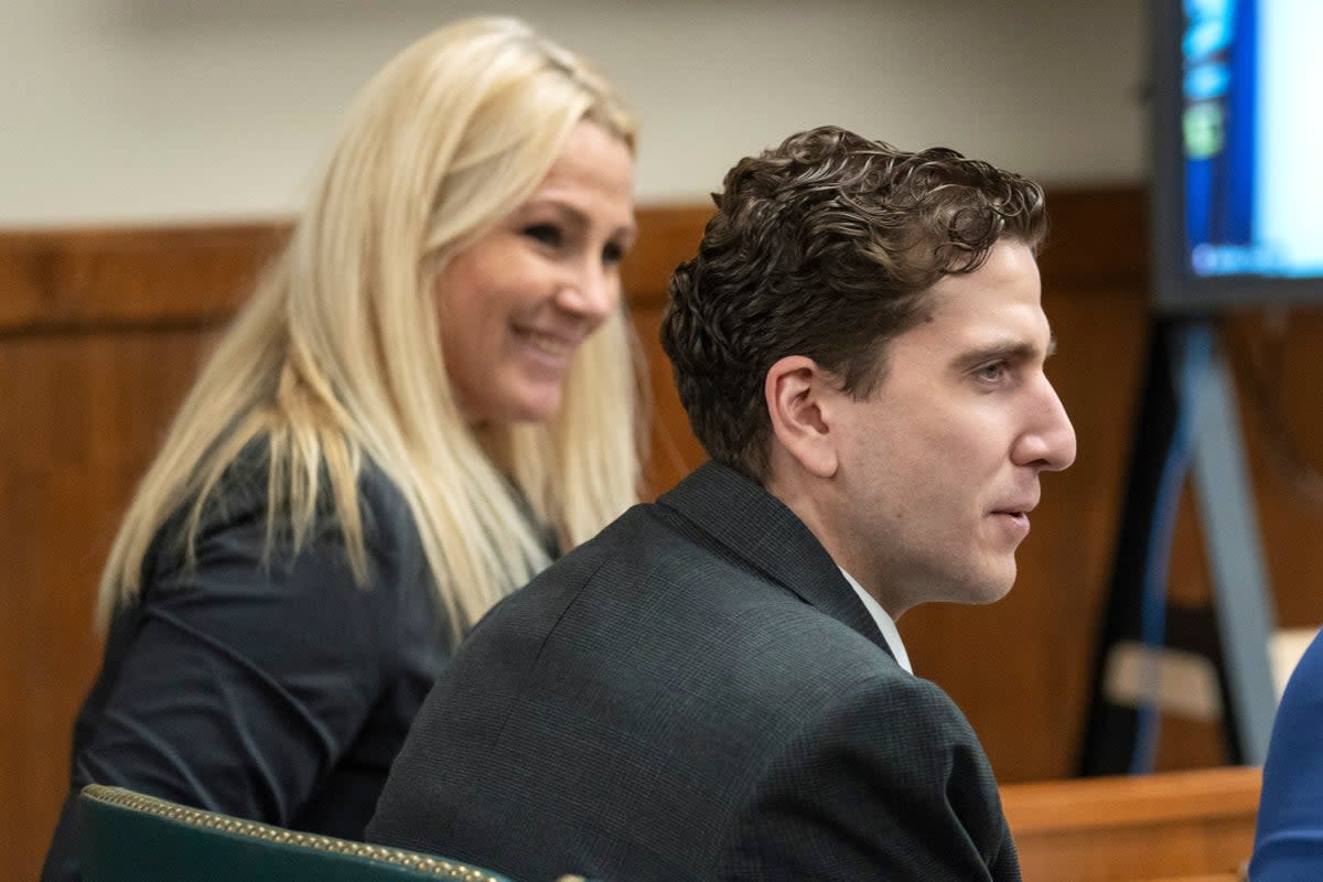 Bryan Kohberger, who is accused of killing four University of Idaho students in November 2022, sits with Anne Taylor, left, one of his attorneys in a court hearing (AP)
