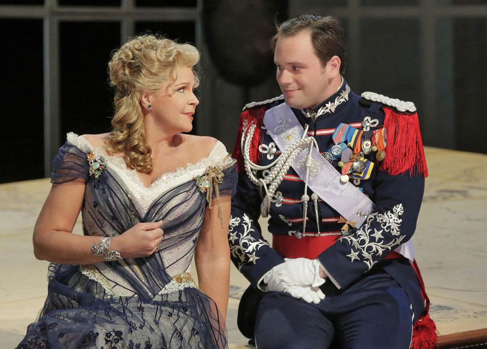 This June 2013 photo provided by the The Santa Fe Opera shows Susan Graham with Paul Appleby, as Fritz, during a rehearsal of an Offenbach comedy, "The Grand Duchess of Gerolstein," at the Santa Fe Opera in Santa Fe, N.M. (AP Photo/The Santa Fe Opera, Ken Howard)