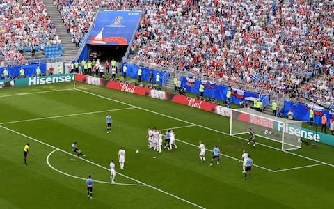 Luis Suarez of Uruguay scores his team's first goal during the 2018 FIFA World Cup Russia group A match between Uruguay and Russia at Samara Arena on June 25, 2018 in Samara, Russia