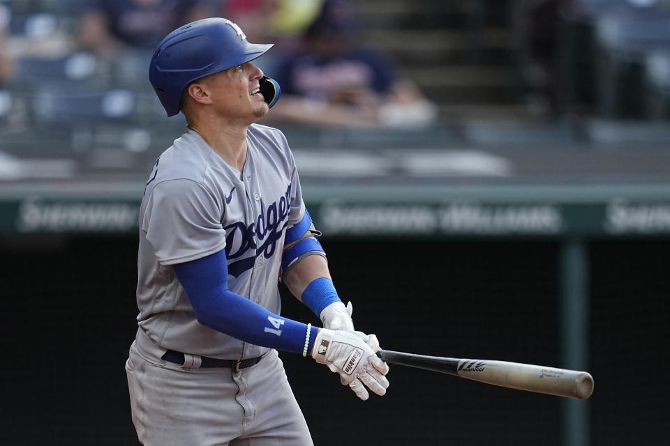 Los Angeles Dodgers' Kiké Hernández watches his home run against the Cleveland Guardians during the ninth inning of a baseball game Thursday, Aug. 24, 2023, in Cleveland. (AP Photo/Sue Ogrocki)