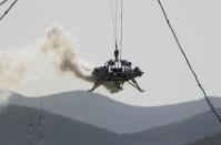 Lander is seen during a hovering-and-obstacle avoidance test for China's Mars mission at a test facility in Huailai