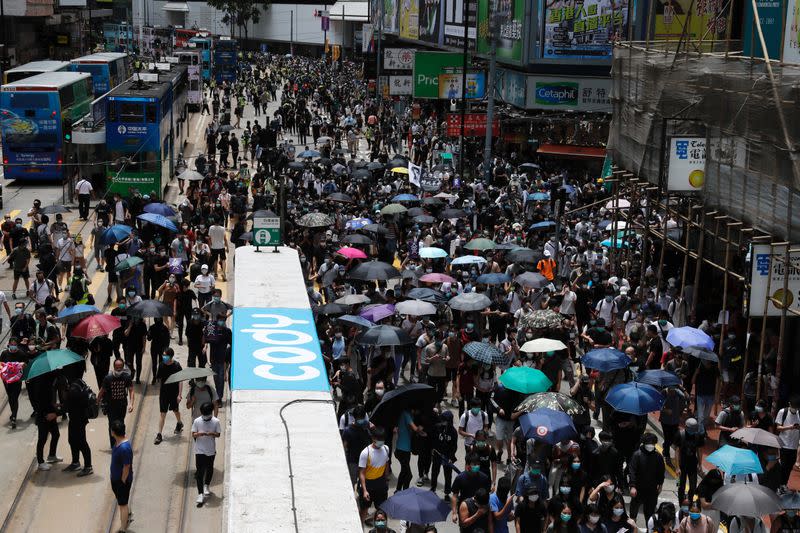 Anti-government protesters march against Beijing's plans to impose national security legislation in Hong Kong