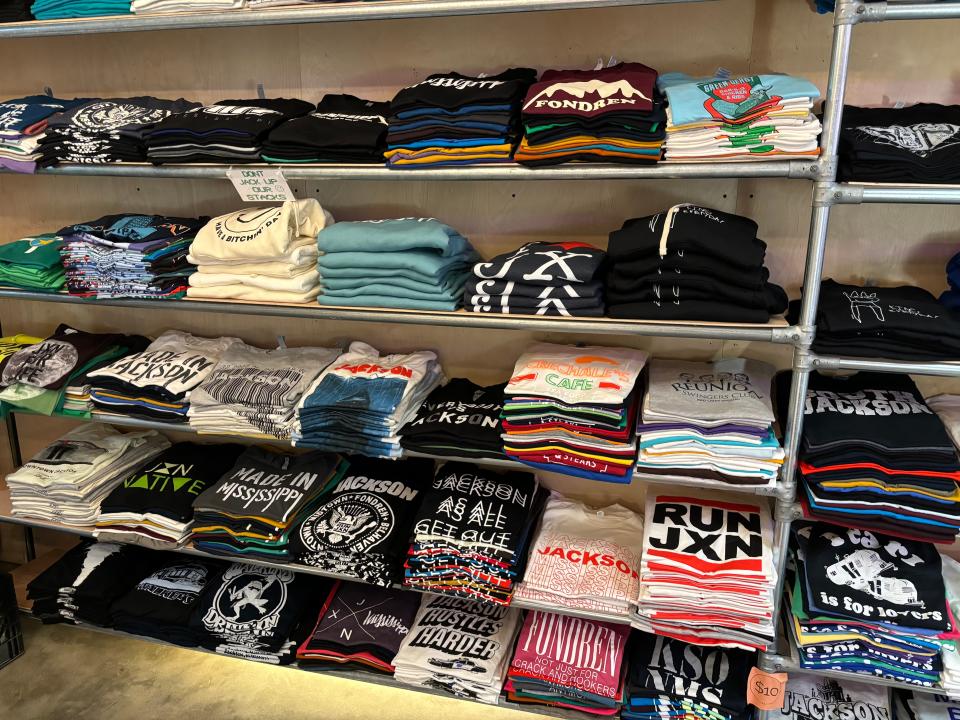 Project Chane shirts on a shelf in Swell-O-Phonic in Jackson.