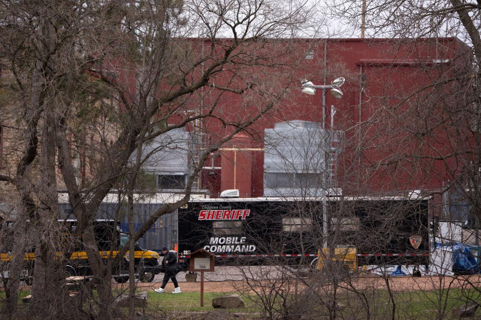 The Chippewa County Sheriff set up a mobile command center in the parking lot of the Leinenkugel's brewery as they process the scene where 10 year-old Iliana 