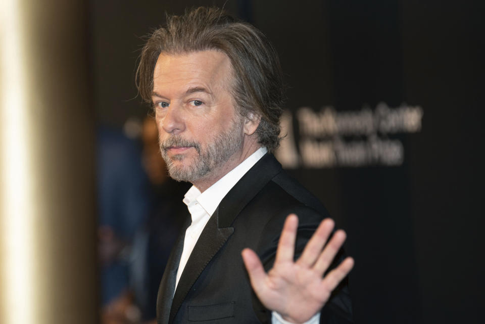 David Spade arrives on the red carpet for the 24th Annual Mark Twain Prize for American Humor at the Kennedy Center for the Performing Arts on Sunday, March 19, 2023, in Washington. (AP Photo/Kevin Wolf)