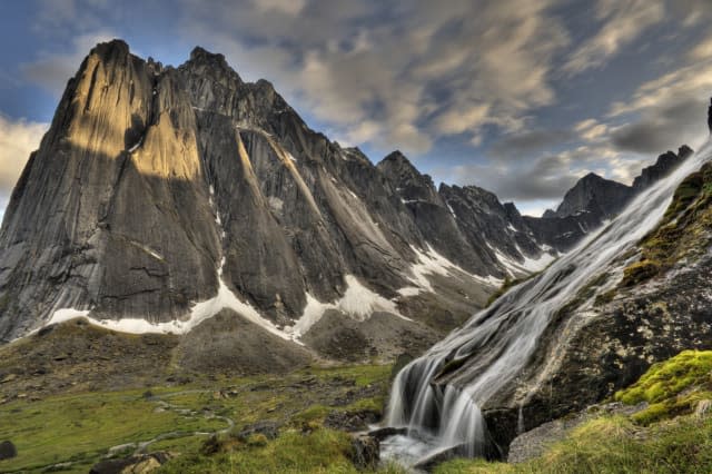 Flowing glacial creek with Mount Harrison Smith in background, Cirque of Unclimbables, Nahanni National Park, Northwest Territor