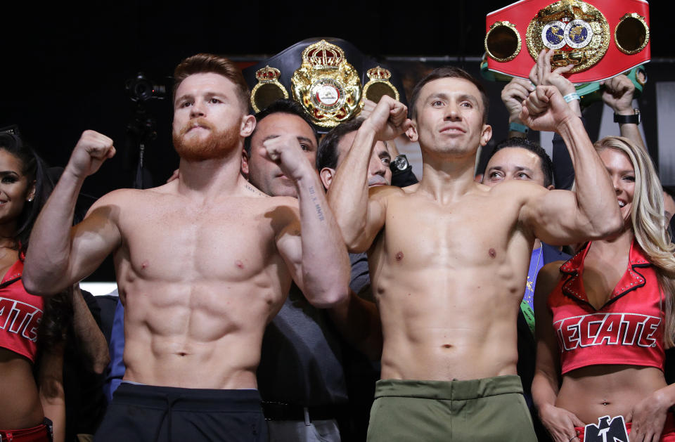 In this Sept. 15, 2017, file photo, Canelo Alvarez and Gennady Golovkin pose during a weigh-in in Las Vegas. (AP Photo)