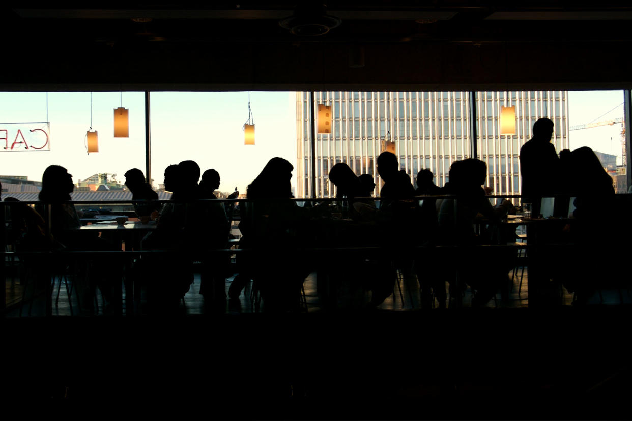 Busy cafe restaurant Getty Images/ferrantraite